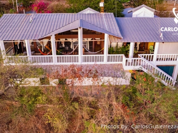 22469 – BEACHFRONT House FOR SALE in La Boquita Nicaragua