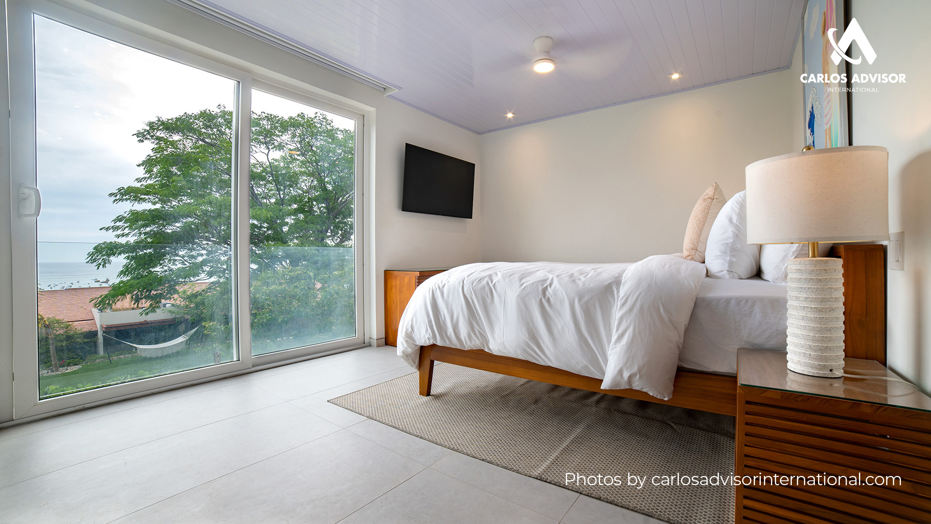 22668 – Beach House For Sale with 9 Bedrooms, Private Bathrooms, and Bay Views